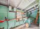 Functional workshop shed with a workbench and storage, perfect for DIY projects at 328 Marine Dr, Anderson, IN 46016