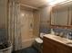 Bathroom featuring a vanity, shower-tub combination, and dolphin wallpaper border at 3310 W State Road 58, Seymour, IN 47274