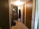 Hallway view with access to bedroom, bathroom, closet, and linen closet at 3310 W State Road 58, Seymour, IN 47274