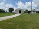 Multiple outbuildings feature storage and workshop on large lot with gravel driveway at 3310 W State Road 58, Seymour, IN 47274
