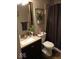 Cozy bathroom with tiled shower and granite vanity at 3330 S Mooresville Rd, Indianapolis, IN 46221