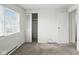 Bright bedroom features a window, closet, and wall to wall carpeting at 3343 Ashley Ln, Indianapolis, IN 46224