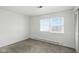 Bright bedroom features a window and wall to wall carpeting at 3343 Ashley Ln, Indianapolis, IN 46224