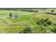 Expansive acreage featuring a well-maintained home, outbuildings, and mature trees at 3450 Clay Rd, North Salem, IN 46165