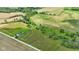 Property aerial view showcases the home's private setting with surrounding greenery at 3450 Clay Rd, North Salem, IN 46165