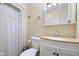 Standard bathroom with toilet, shower with curtain, vanity, sink and mirror at 3450 Clay Rd, North Salem, IN 46165