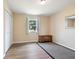 Bright bedroom featuring a window view, wood floors, and a closet at 3450 Clay Rd, North Salem, IN 46165