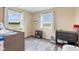 Cozy bedroom with two windows and wood laminate flooring at 3450 Clay Rd, North Salem, IN 46165