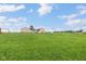 Spacious front yard featuring a charming home, shed, and room to roam at 3450 Clay Rd, North Salem, IN 46165