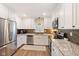 Modern kitchen with stainless steel appliances, granite countertops, and ample cabinetry at 3450 Clay Rd, North Salem, IN 46165