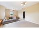 Spacious living room with neutral carpet, chandelier, and a comfortable couch at 3450 Clay Rd, North Salem, IN 46165