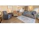 Spacious living room with cozy seating, wood-look flooring, and neutral decor at 3450 Clay Rd, North Salem, IN 46165