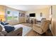 Comfortable living room showcasing a plush sofa, recliner, and natural light at 3450 Clay Rd, North Salem, IN 46165