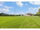 Expansive yard with a well-manicured lawn and an American flag waving at 3450 Clay Rd, North Salem, IN 46165
