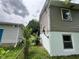 View of the home's siding, foundation, and landscaping at 3525 Lombardy Pl, Indianapolis, IN 46226