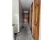 Upper hallway features new carpet and is freshly painted in neutral colors at 3525 Lombardy Pl, Indianapolis, IN 46226