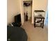 This bedroom has a closet, aquarium, tv and a small amount of clutter at 4404 London Ct, Indianapolis, IN 46254
