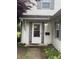 Close-up of the front door with sidelights and a practical mailbox at 4404 London Ct, Indianapolis, IN 46254