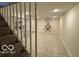 Finished basement features tile flooring, recessed lighting, and plenty of space at 4405 Primrose Ave, Indianapolis, IN 46205