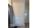 Floor to ceiling pantry with 8 doors and metal handles at 4405 Primrose Ave, Indianapolis, IN 46205