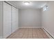 Finished basement area showing a closet and a light-toned tile floor at 4517 E 16Th St, Indianapolis, IN 46201