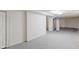 Unfinished basement with a modern hot water tank at 4517 E 16Th St, Indianapolis, IN 46201