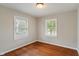 Bedroom with two windows, providing natural light and ventilation throughout the space at 4517 E 16Th St, Indianapolis, IN 46201