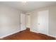 Bedroom with two doors, offering easy access and flow within the home at 4517 E 16Th St, Indianapolis, IN 46201