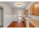 Functional kitchen space with ample counter space, wooden cabinets, and bright, natural lighting at 4517 E 16Th St, Indianapolis, IN 46201
