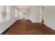 Open living area with beautiful hardwood floors, providing a warm and inviting atmosphere at 4517 E 16Th St, Indianapolis, IN 46201