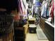 A walk-in closet with hanging clothes and multiple storage options at 4521 Tulip N Dr, Martinsville, IN 46151