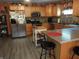 Modern kitchen with stainless steel appliances, custom cabinetry, island and breakfast bar at 4521 Tulip N Dr, Martinsville, IN 46151