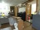 A living room with grey sofa and wood trim doorway at 4521 Tulip N Dr, Martinsville, IN 46151
