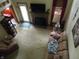 Aerial shot of a living room with a fire place, large couch, and a recliner at 4521 Tulip N Dr, Martinsville, IN 46151