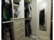 Walk-in closet with custom shelving, drawers, mirror and organized storage at 4521 Tulip N Dr, Martinsville, IN 46151