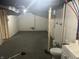 Unfinished basement with basic fixtures at 4723 Crittenden Ave, Indianapolis, IN 46205