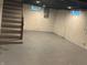 Spacious unfinished basement space with access to stairs at 4723 Crittenden Ave, Indianapolis, IN 46205