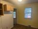 Kitchen with wooden cabinets and ample lighting at 4723 Crittenden Ave, Indianapolis, IN 46205