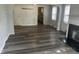 Inviting living room with hardwood floors, fireplace, and ample natural light at 4723 Crittenden Ave, Indianapolis, IN 46205