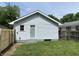Exterior view of a light blue detached garage in the backyard at 5115 Primrose Ave, Indianapolis, IN 46205