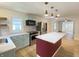 Bright kitchen with stainless steel appliances, center island, and stylish pendant lights at 5115 Primrose Ave, Indianapolis, IN 46205