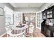 Elegant dining room with an open layout to the living area and stylish furnishings at 5217 Dunewood Way # 3002, Avon, IN 46123