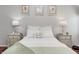 Relaxing main bedroom with soft lighting and a plush bed featuring decorative pillows at 5217 Dunewood Way # 3002, Avon, IN 46123