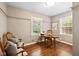 Cozy office with hardwood floors, natural light, and neutral paint at 6030 Evanston Ave, Indianapolis, IN 46220