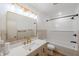 Updated bathroom featuring modern fixtures, a new vanity and a tub/shower combo at 608 Manhattan Ave, Indianapolis, IN 46241