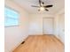 An empty bedroom with wood-look flooring and a closet at 608 Manhattan Ave, Indianapolis, IN 46241