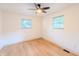 Empty bedroom featuring wood-look flooring and a ceiling fan at 608 Manhattan Ave, Indianapolis, IN 46241