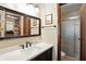 Elegant bathroom features a mirrored closet and shower for a sleek and functional space at 610 Front Royal Dr, Indianapolis, IN 46227