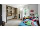 bedroom with closet, natural light, and playful decor at 610 Front Royal Dr, Indianapolis, IN 46227