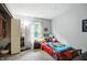 Fun, -friendly bedroom with red car bed and ample natural light at 610 Front Royal Dr, Indianapolis, IN 46227